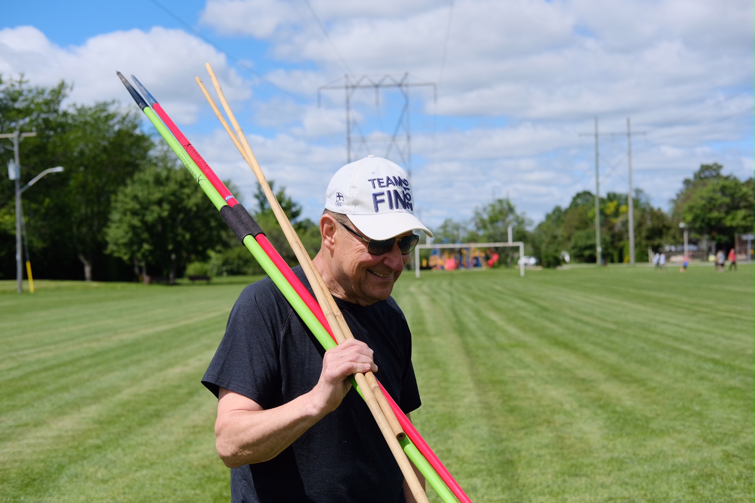 Bill Heikkila coaching on the field