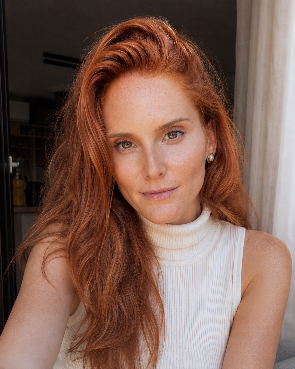 Marika D'Incà Levis — founder of RE·CORDIS — portrait with flowing auburn hair in warm golden light