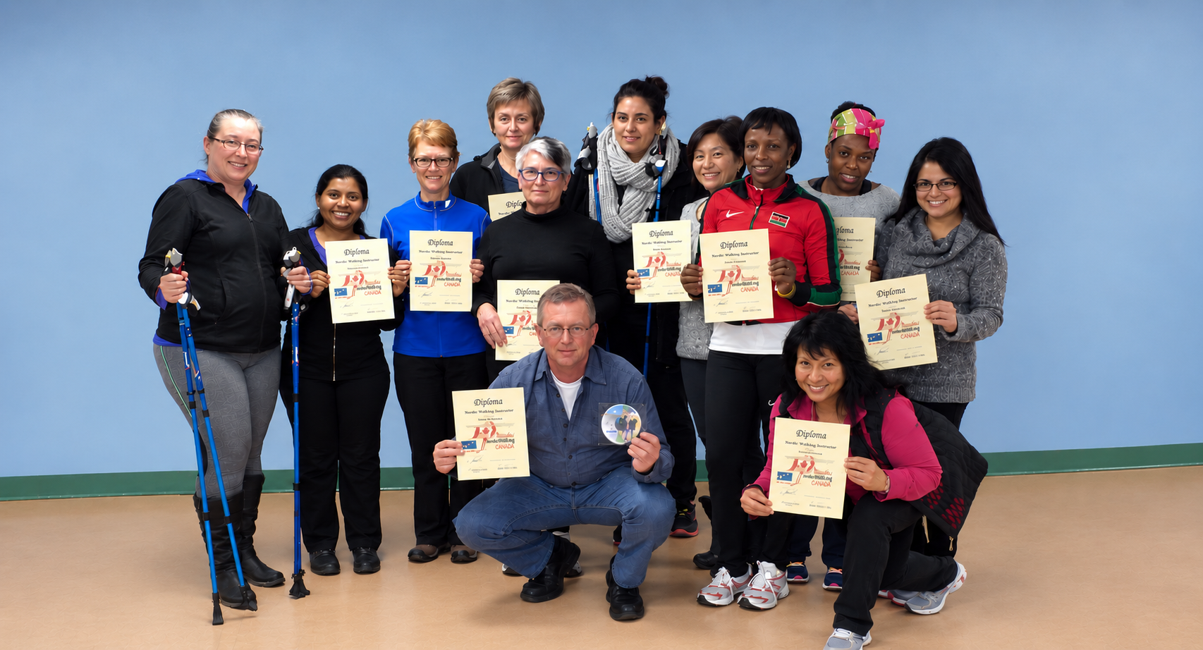 Nordixx instructor certification graduates holding their diplomas
