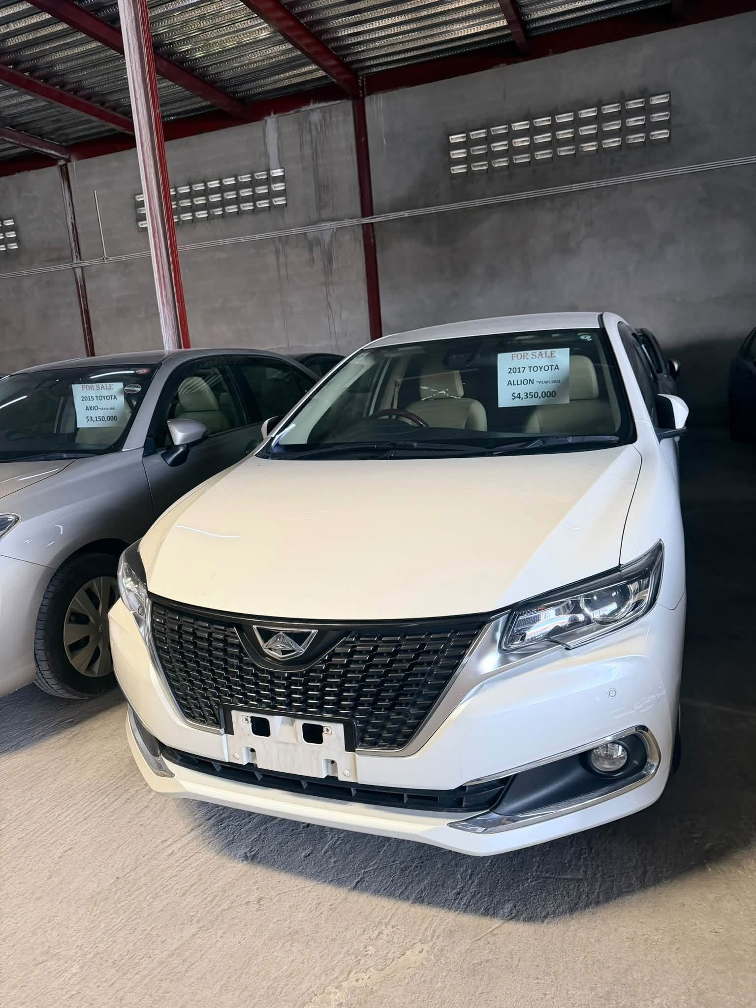 2017 Toyota Allion Pearl White — three-quarter front view showing full body and interior