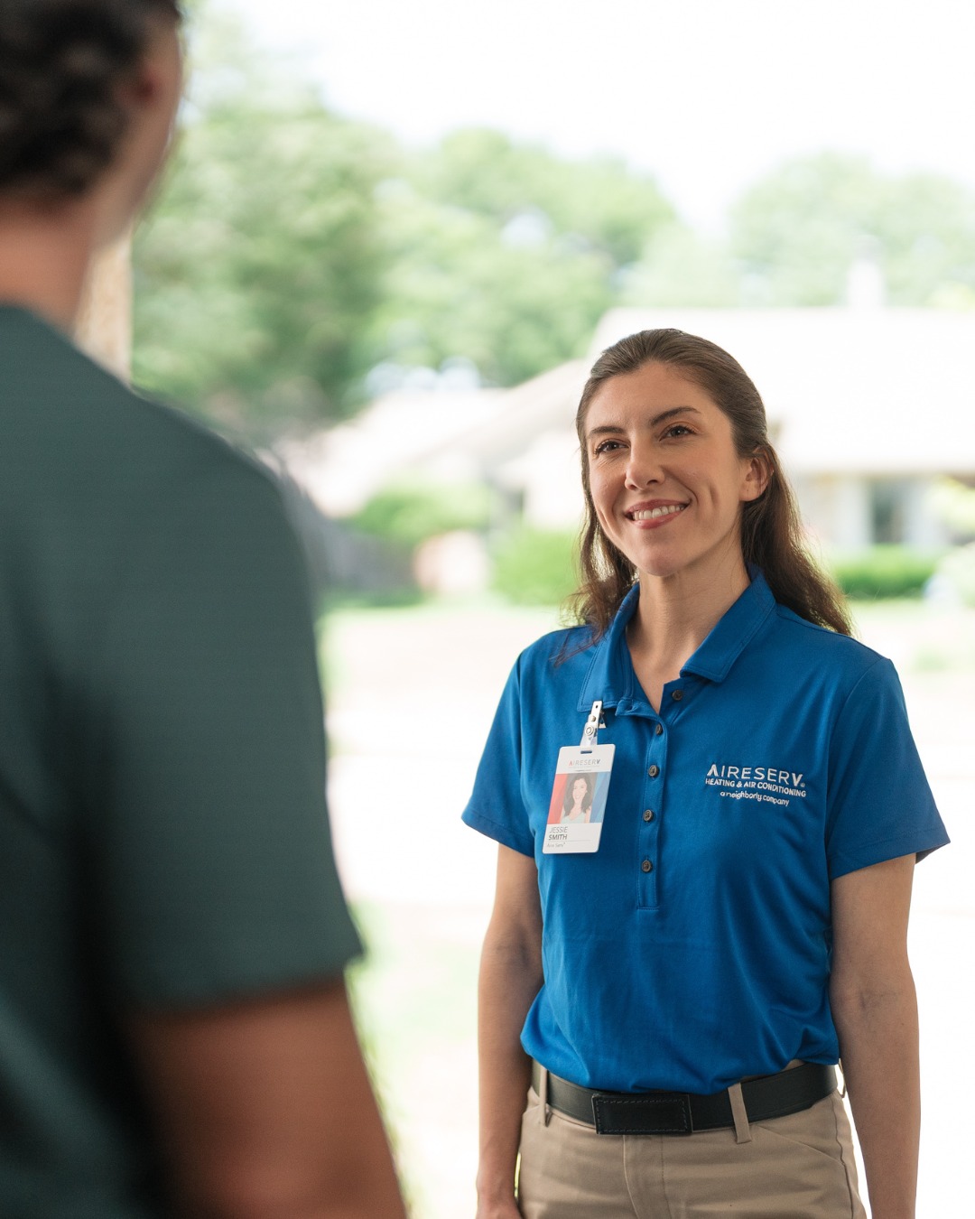 Aire Serv technician greeting customer