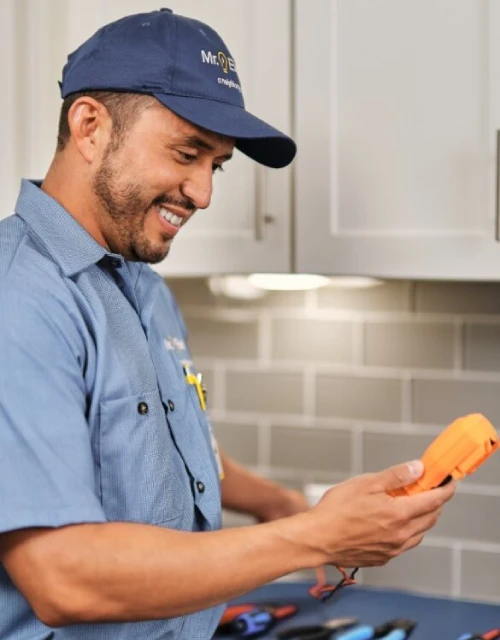 Smiling Mr. Electric technician