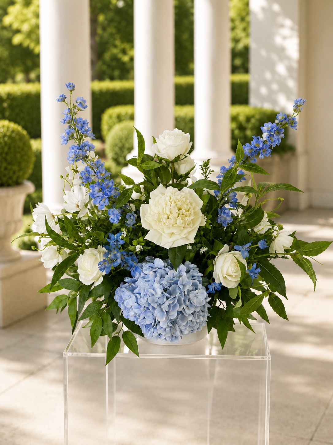 Table Centerpieces — blue and white floral arrangement