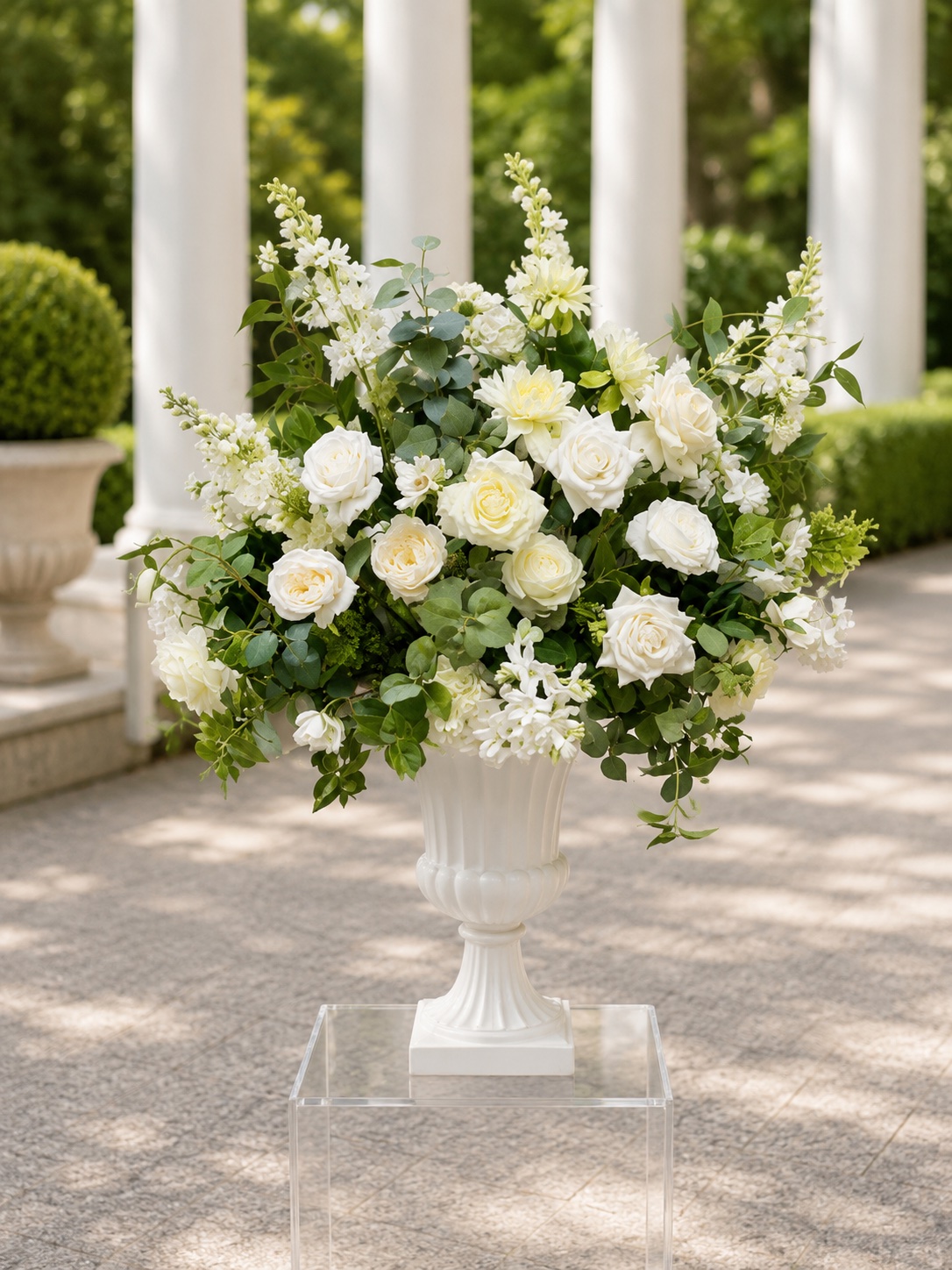 Timeless Classic collection hero - white floral urn arrangement with roses and greenery
