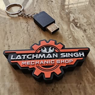 L.Singh Mechanic Shop branded rubber keychain with USB adapter